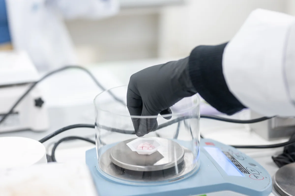 Pharmacy compounding instrument on a table