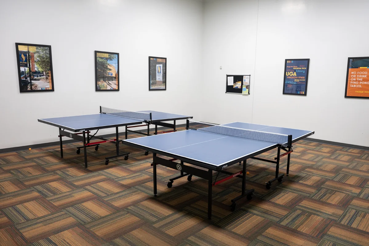 Table tennis tables in the rec room at PCOM Georgia