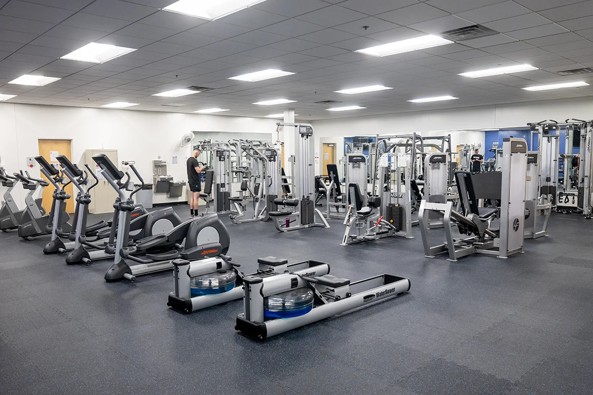Wide view of the cardiovascular machines and equipment in the weight room