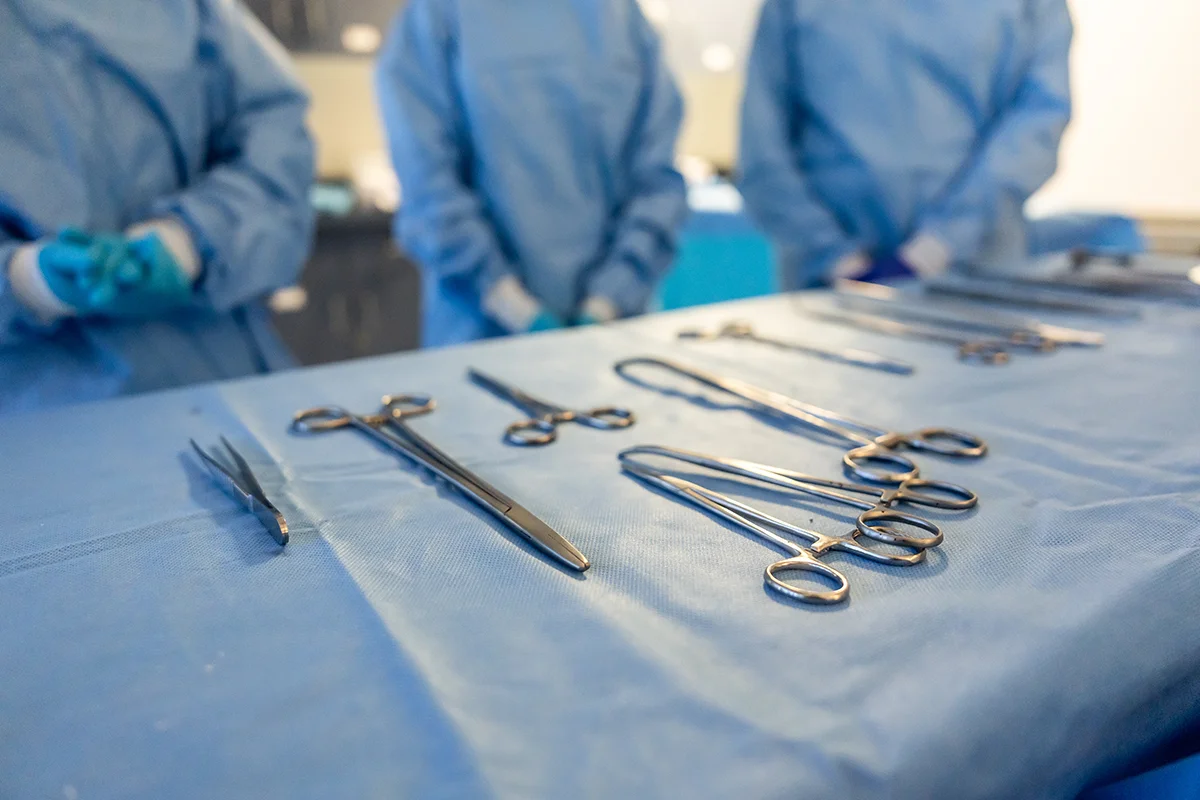 Surgery tools laying on a table in the surgery simulation area