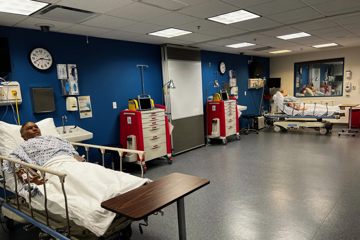 Wide view of the CLAC's trauma room and simulation mannequins