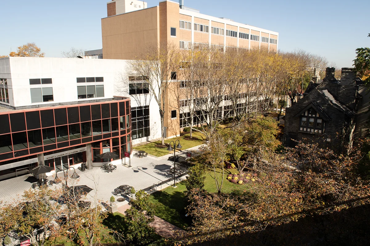 Wide aerial shot of PCOM's central courtyard during autumn