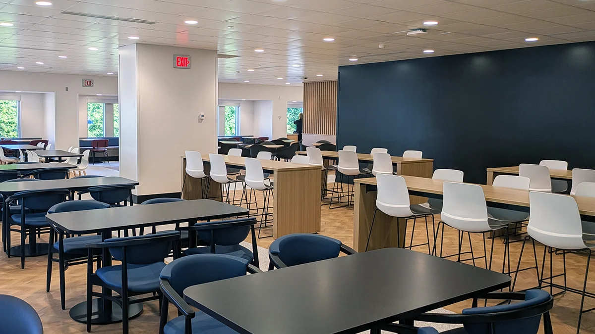 Rows of tables and chairs in the dining area