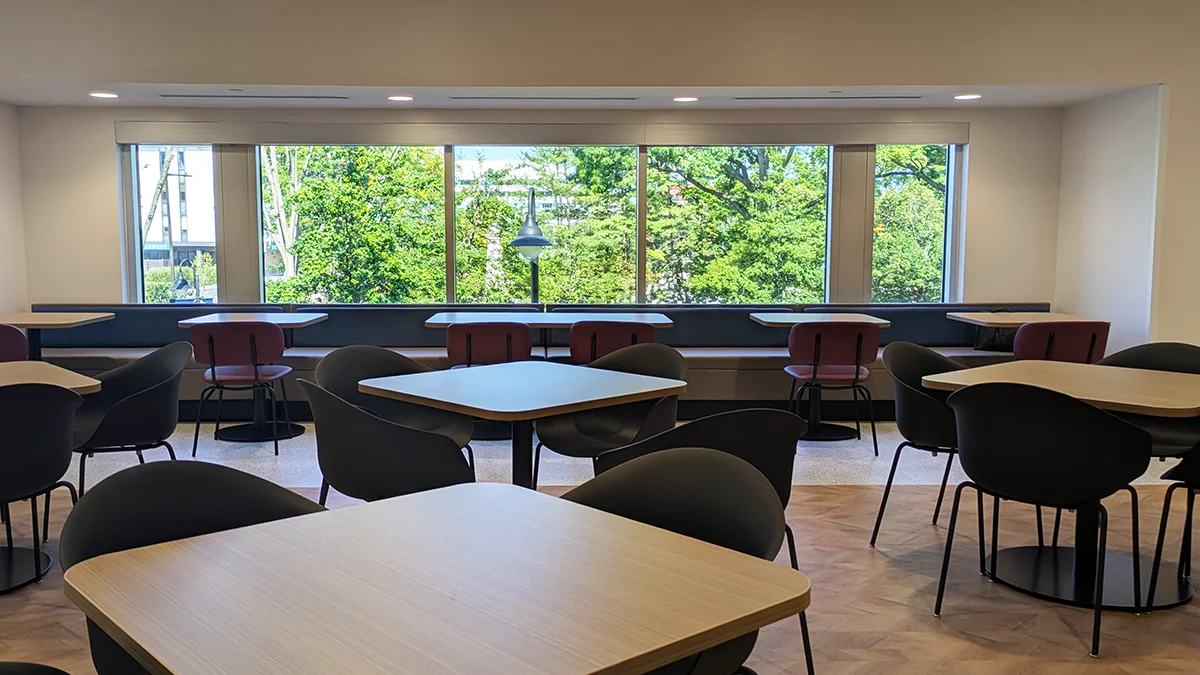 Rows of tables and chairs in the dining area