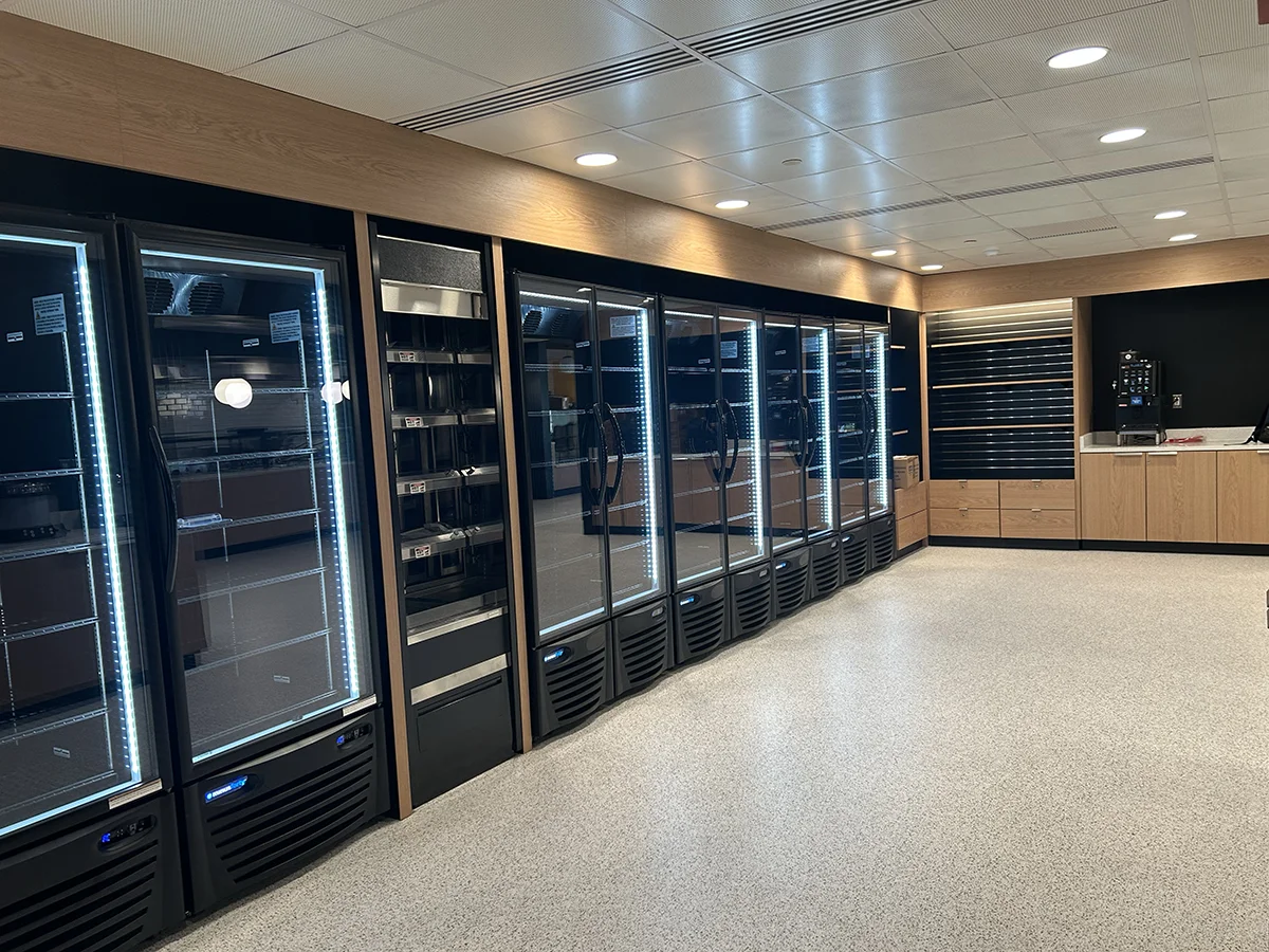 Refrigerators and shelving in the 24/7 marketplace cafe