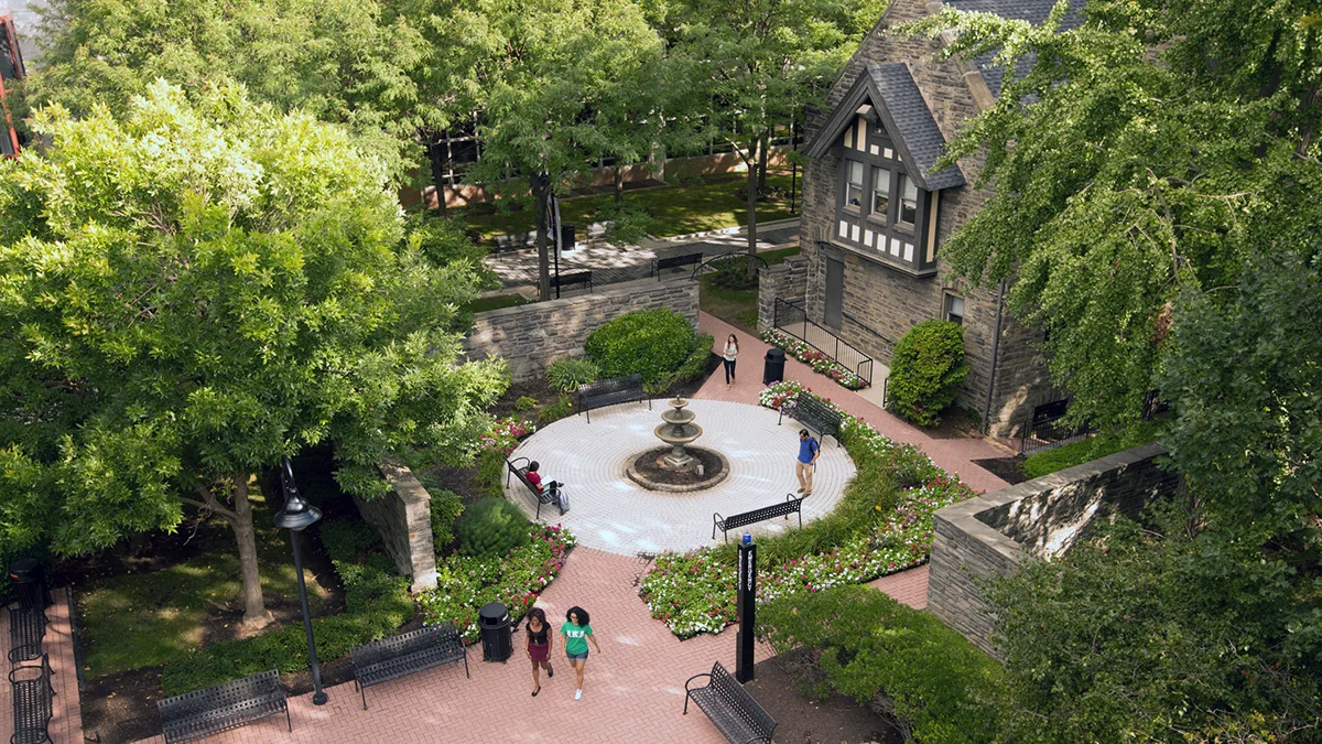 Aerial shot of PCOM's Philadelphia campus fountain and garden area during summer