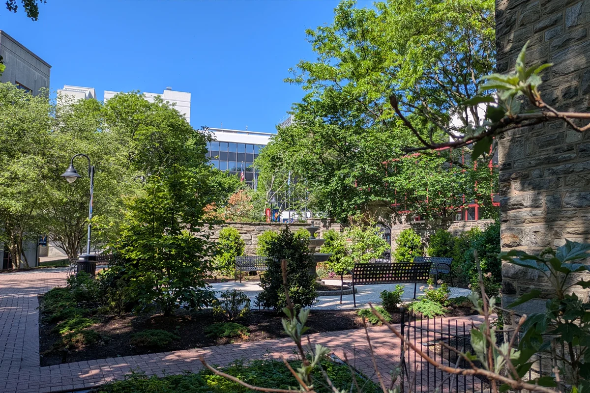 Rear view of the Robert Gober, DO '78, Fountain and Donor Garden looking toward Rowland Hall