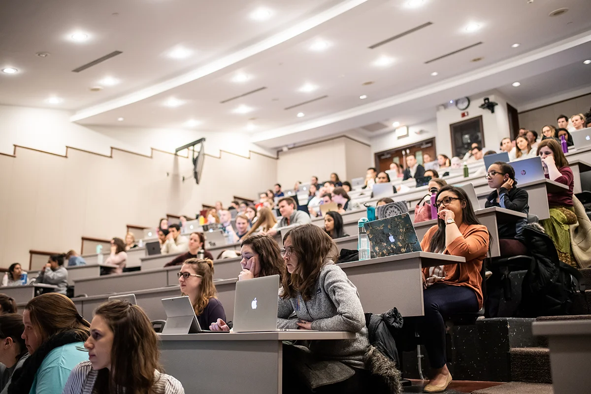 Students taking notes on laptops during a lecture in one of the two amphitheaters in PCOM's Hassman Academic Center