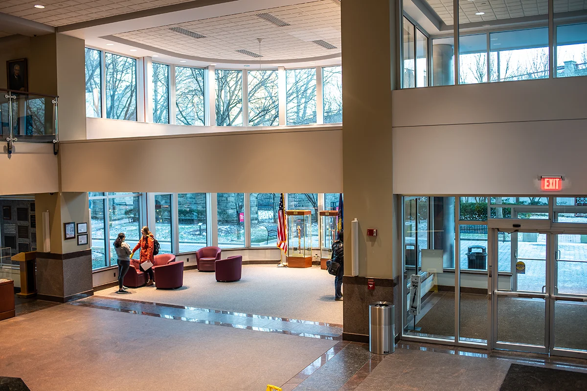 View of the main doors and windows of the lobby from the top of the main stairwell
