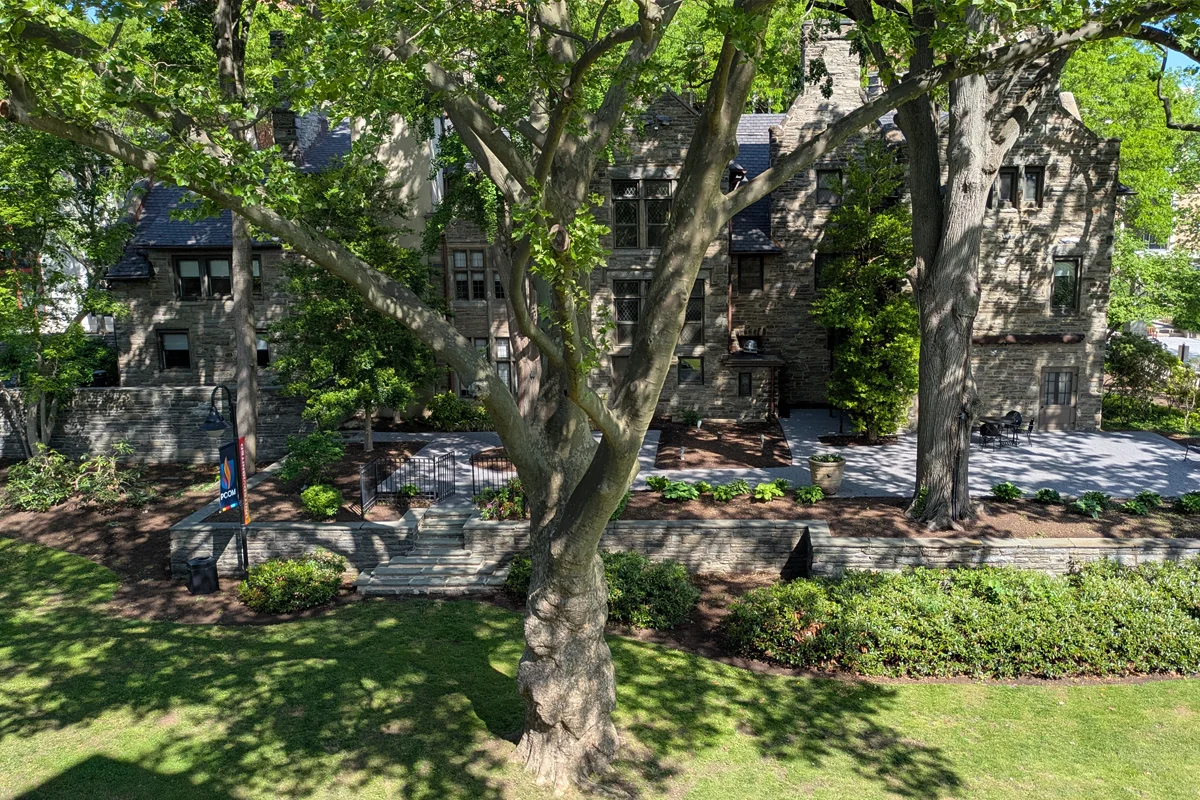 Aerial view of the rear of Levin building and its stone patio area