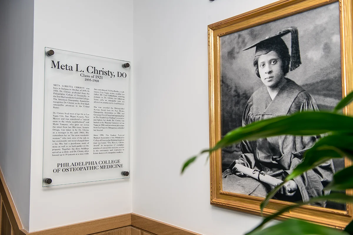 Meta L. Christy, DO, dedication portrait and plaque in the lobby