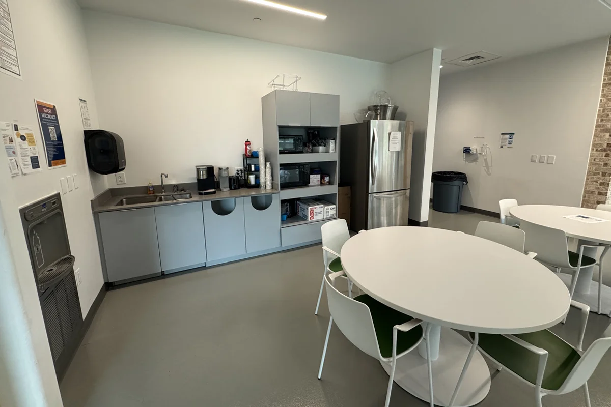 Refrigerators, sinks and supplies in the dining area