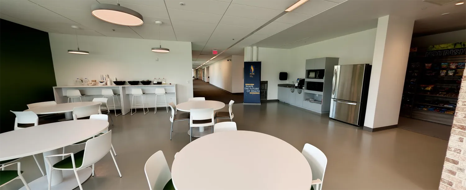 Wide view of the snacks and additional tables in the Student Dining Area