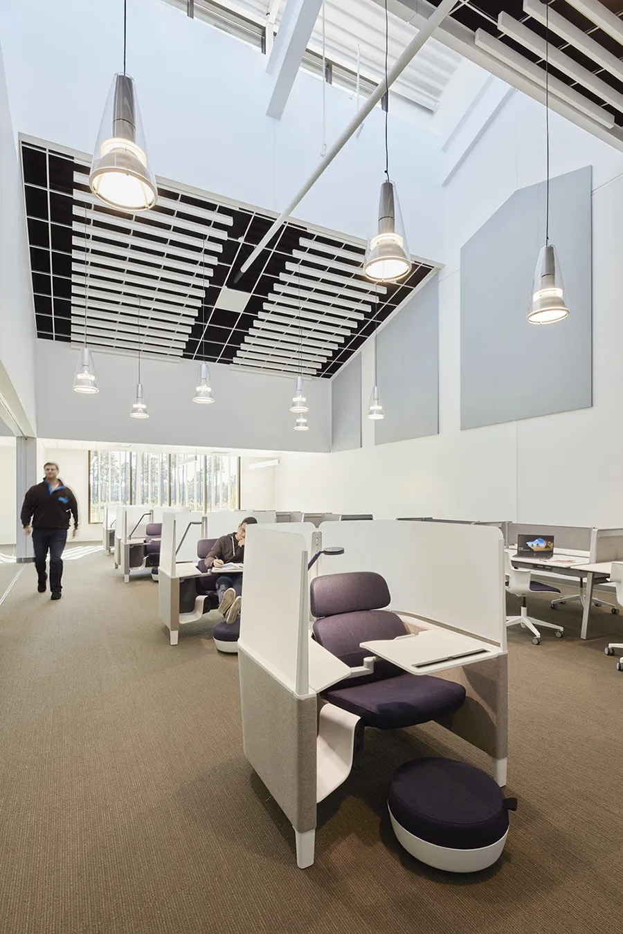 Students sitting and working within the study pod furniture at PCOM South Georgia