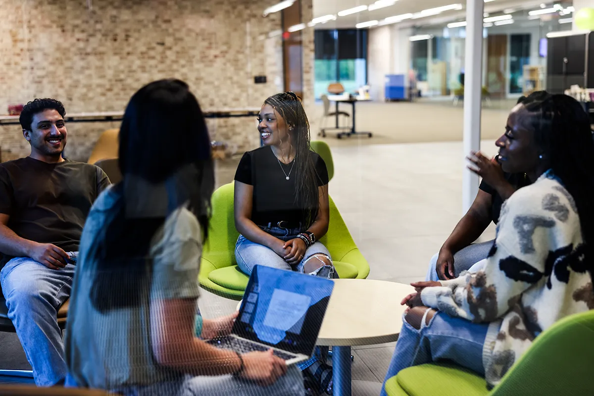 Students talking in PCOM South Georgia's main lobby