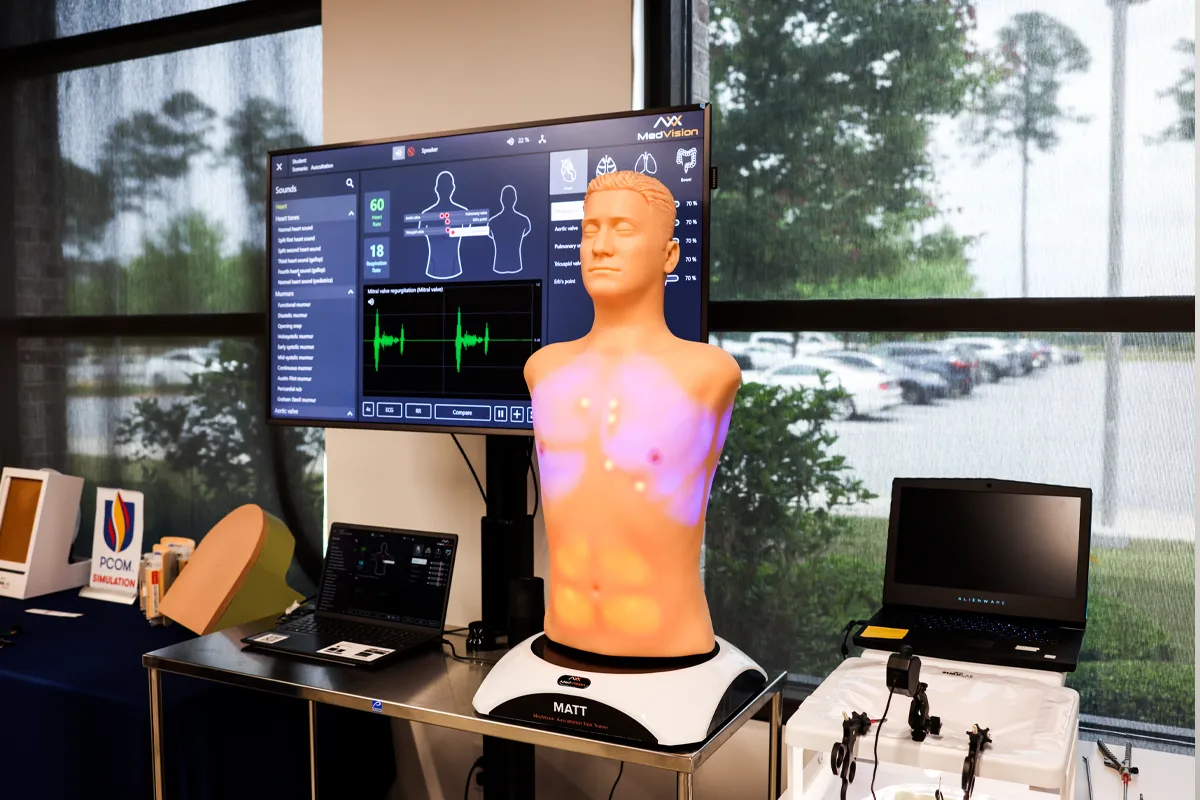 Simulation center patient diagnostic equipment and a male torso mannequin