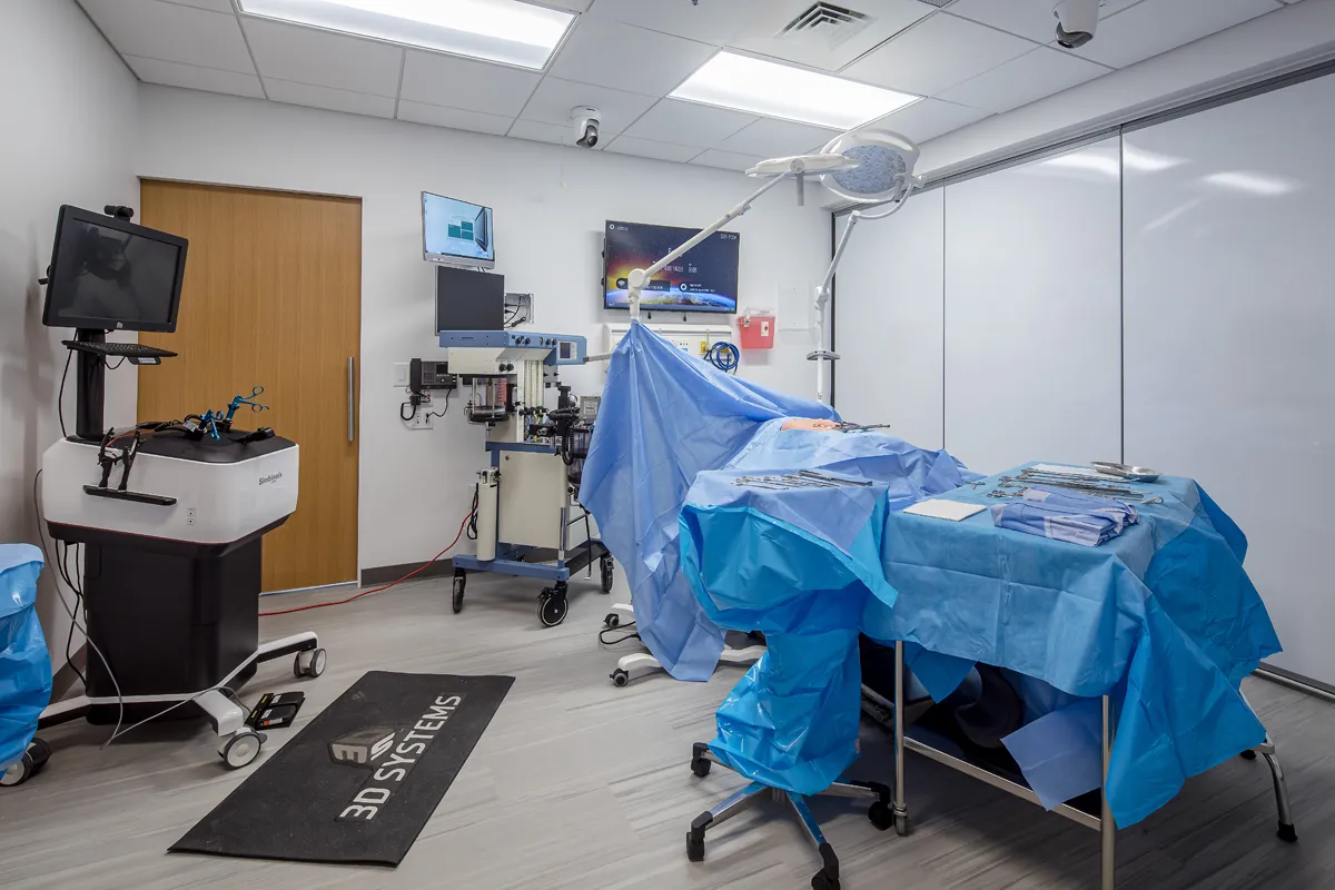 Simulated surgery table and other hospital equipment in the Simulation Center