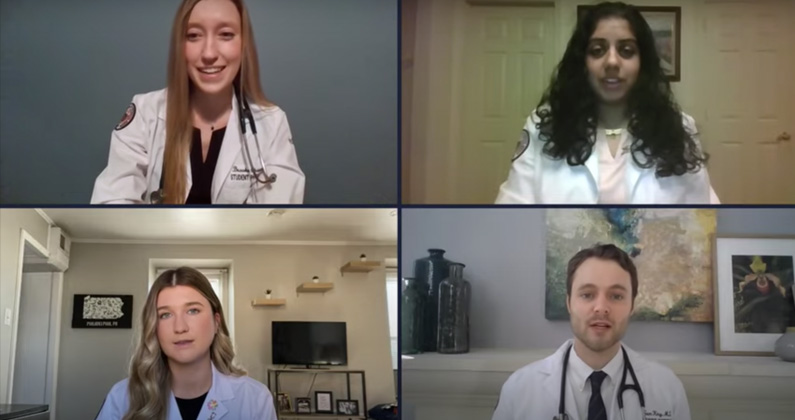 PCOM medical students repeat the pledge of professionalism while they wear their white coats during a video call.
