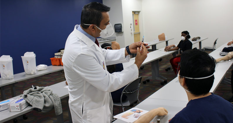 Dr. Moradi and Dr. Little of PCOM Georgia explain how medical students are learning to vaccinate to help with the COVID pandemic.