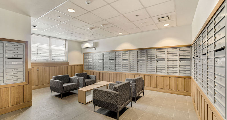 The mail room and lounge area in PCOM's Meta Christy House, an on-campus housing unit for PCOM students.