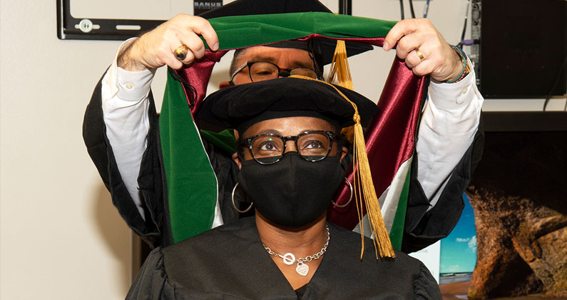 The 2021 ACOFP induction ceremony was cancelled due to COVID, so PCOM faculty held a small, private ceremony for Dr. Williams-Page.