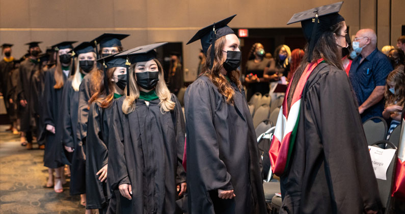 77 physician assistant studies and biomedical sciences graduate students earned their master's degrees from PCOM Georgia on July 27, 2021.
