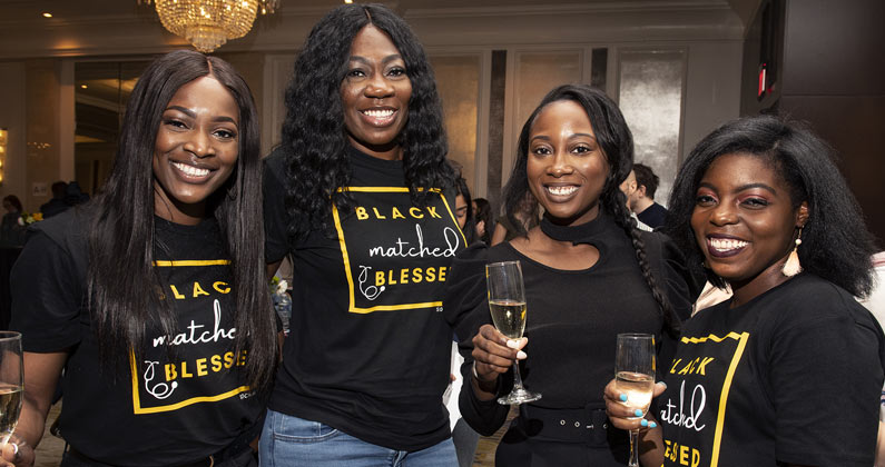 A PCOM DO student celebrates her residency match with her family for Match Day 2022.