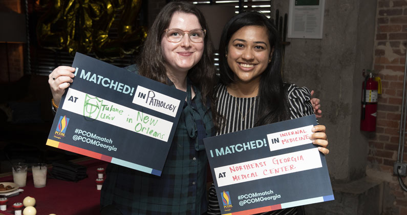 Two PCOM Georgia DO students celebrate match day 2022.