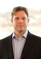 Professional headshot photograph of Dr. Neal Walker, Advisor